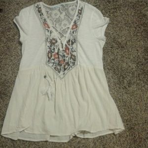 Very nice and comfortable top with ties. Off white